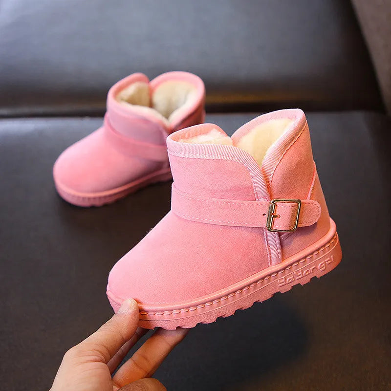Warm, durable blue kids' winter boots, ideal for boys and girls playing in snow, with cozy padding.