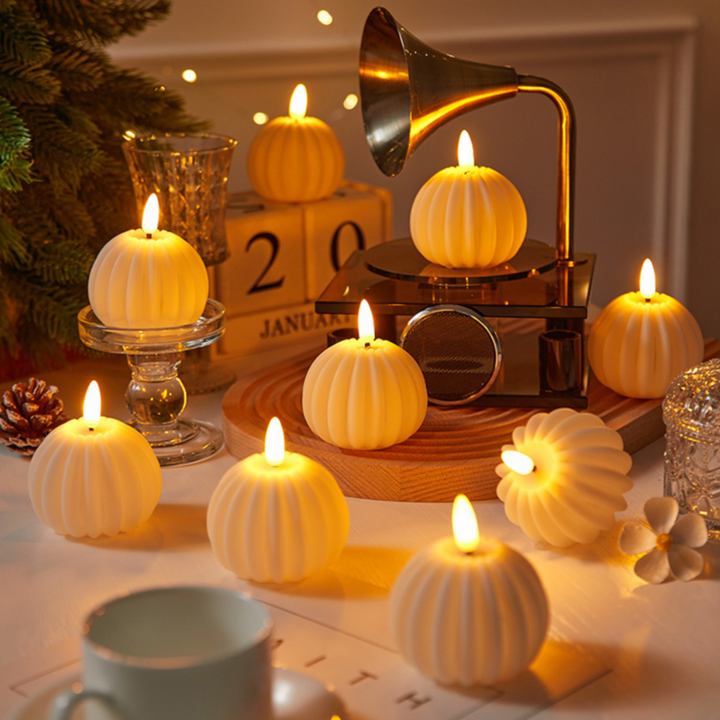 Warm glowing flameless LED candles, perfect for home decor & creating cozy ambiance.