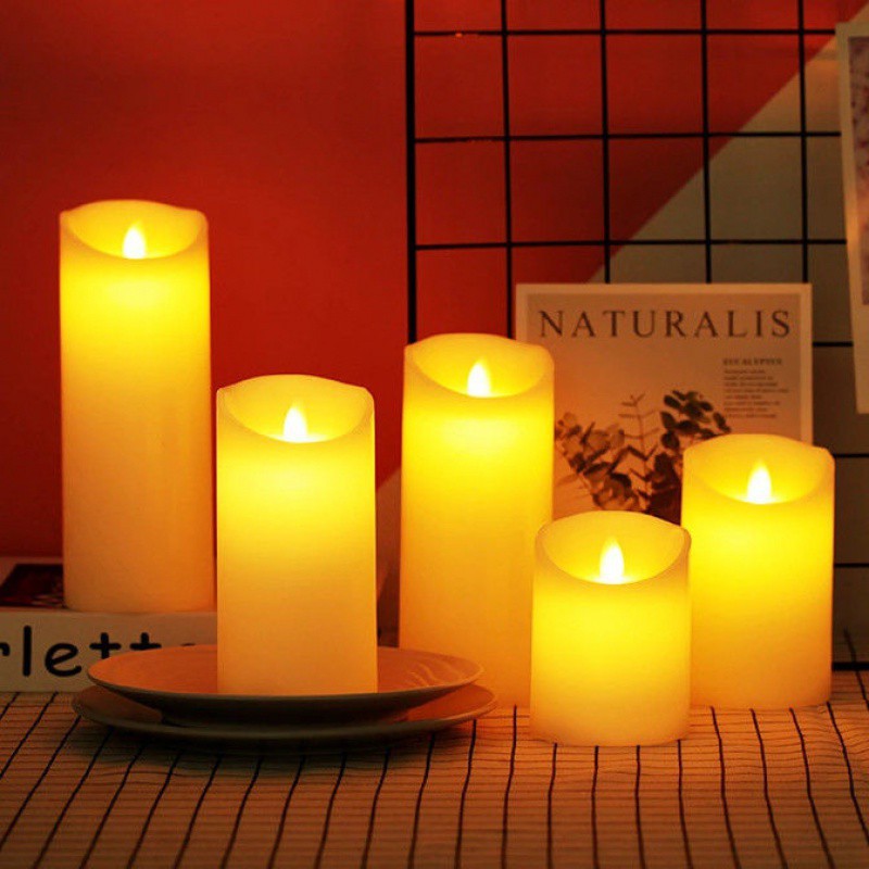 Flameless LED candles glowing softly, enhancing holiday decor or everyday home warmth.