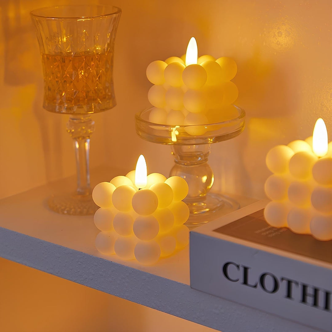 Elegant GlowFlicker LED candles, providing realistic flickering light for any home ambiance.