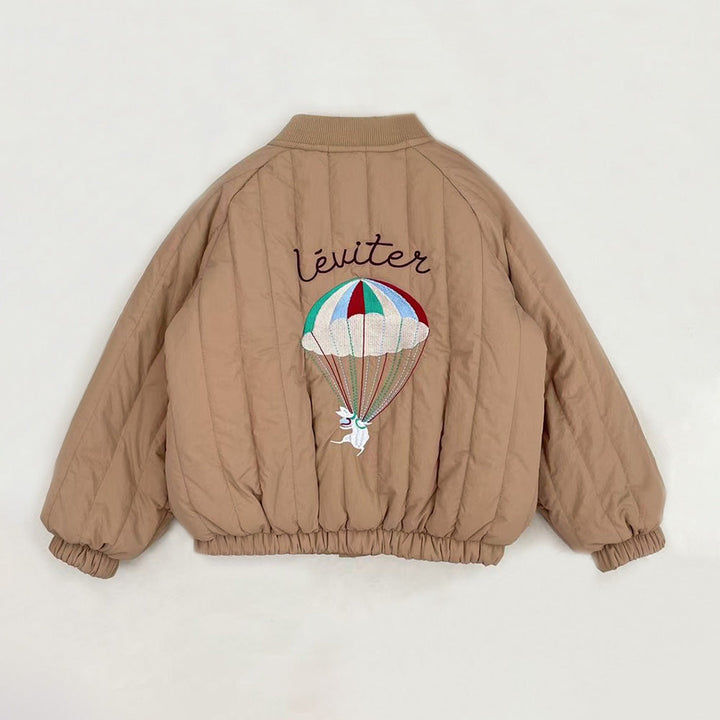 Kids' winter jacket with soft fleece lining, unisex design, durable and warm for play