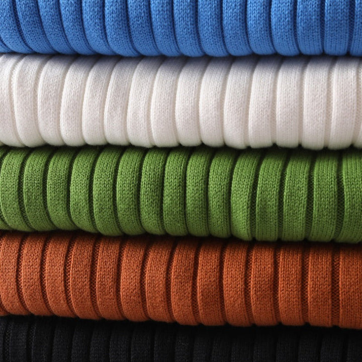 Sculpted fit men's ribbed turtleneck sweater, warm long sleeve. Versatile & cozy for winter fashion.
