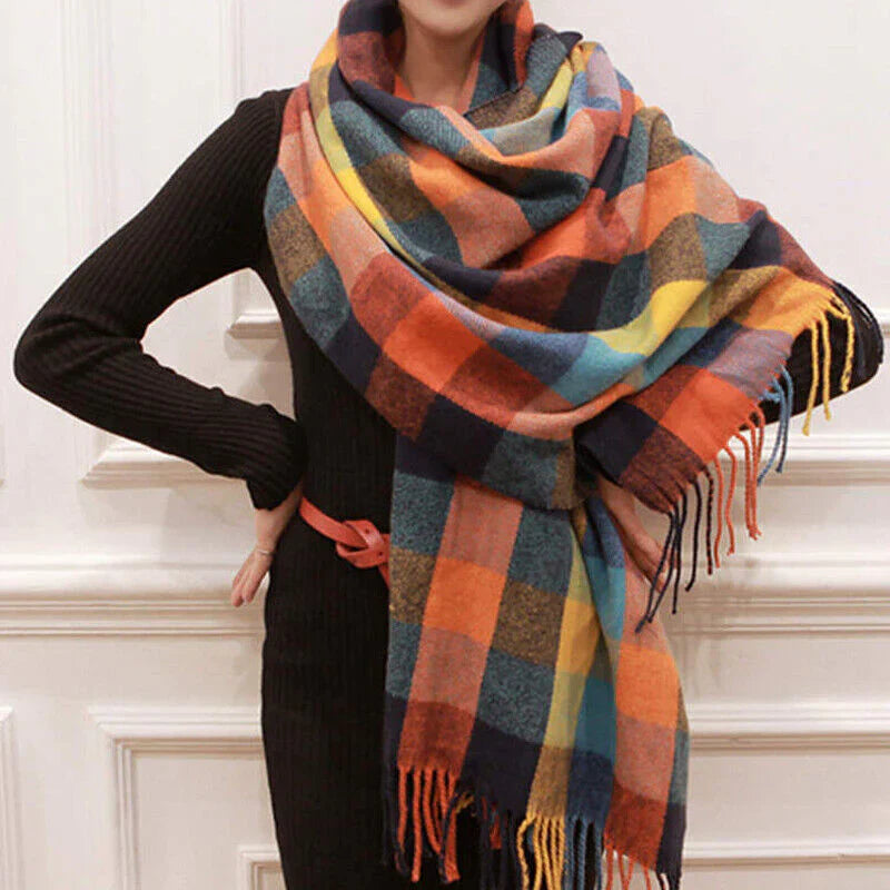Chic women's cashmere scarf in a classic check, a luxurious accessory for winter gifting.