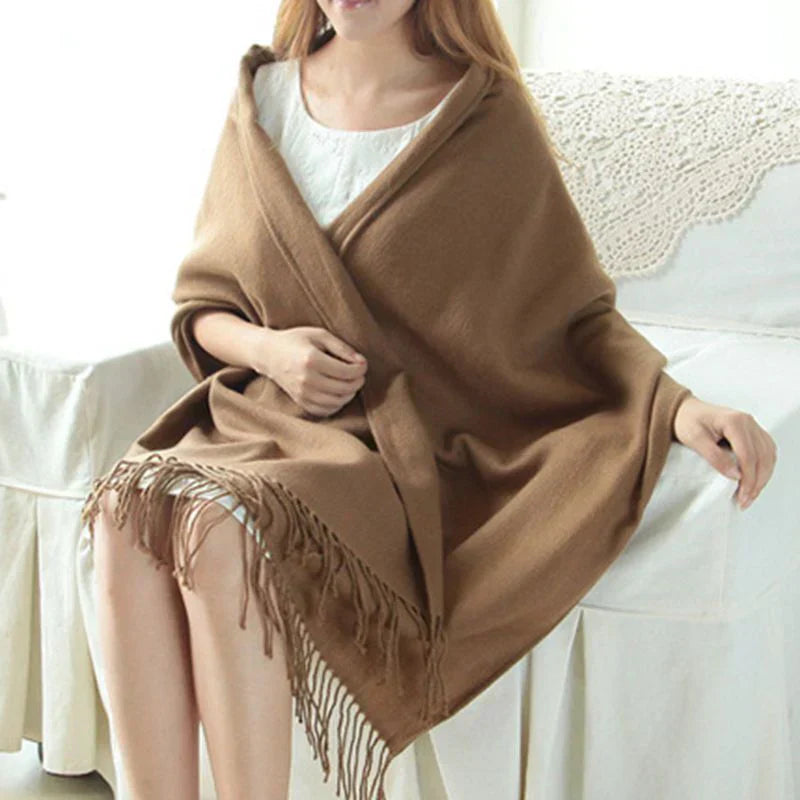 Elegant women's cashmere scarf featuring a timeless check design, a must-have winter accessory.
