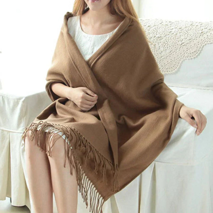 Elegant women's cashmere scarf featuring a timeless check design, a must-have winter accessory.