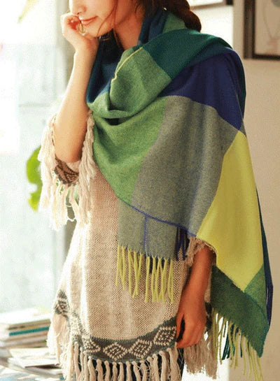 Soft women's plaid cashmere scarf, offering warmth and style, perfect for any winter outfit.
