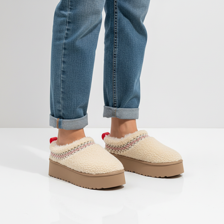 Stylish women's padded slippers, designed for warmth and non-slip security indoors