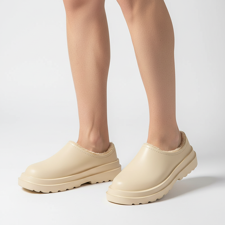 Unisex winter slipper soles by WarmTrail with insulation, waterproofing, and non-slip tread
