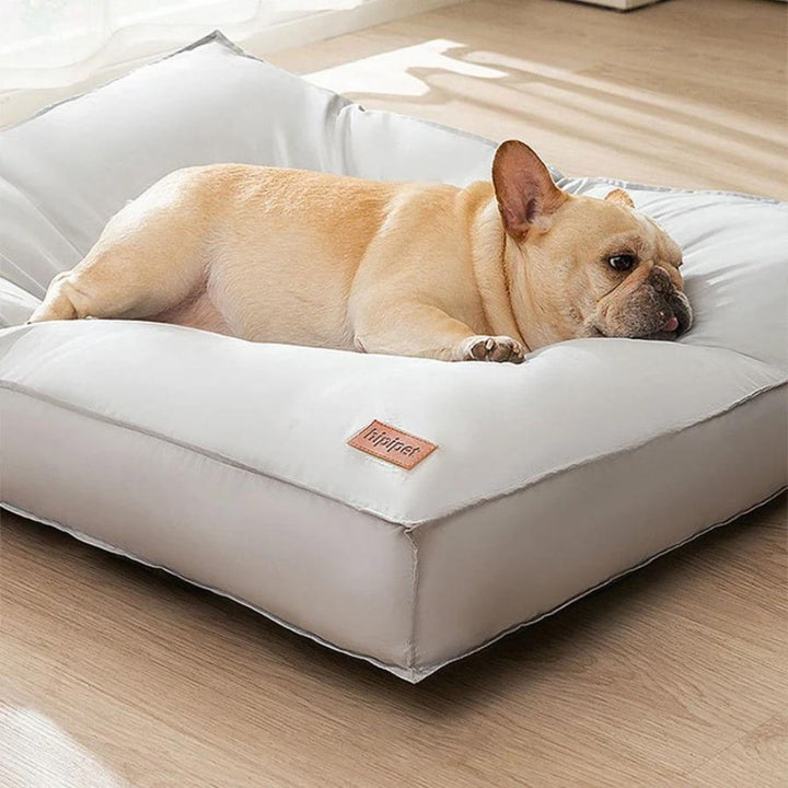 Waterproof comfortable pet bed for dogs & cats. Washable, non-slip base ensures pet comfort & safety.