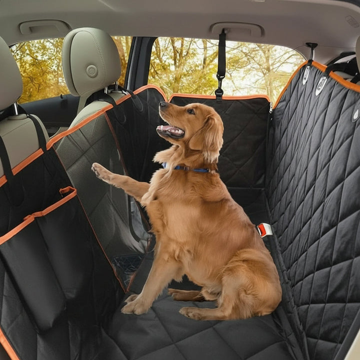 Easy-clean pet car cover protecting vehicle seats from dog hair, mud, and spills during travel.