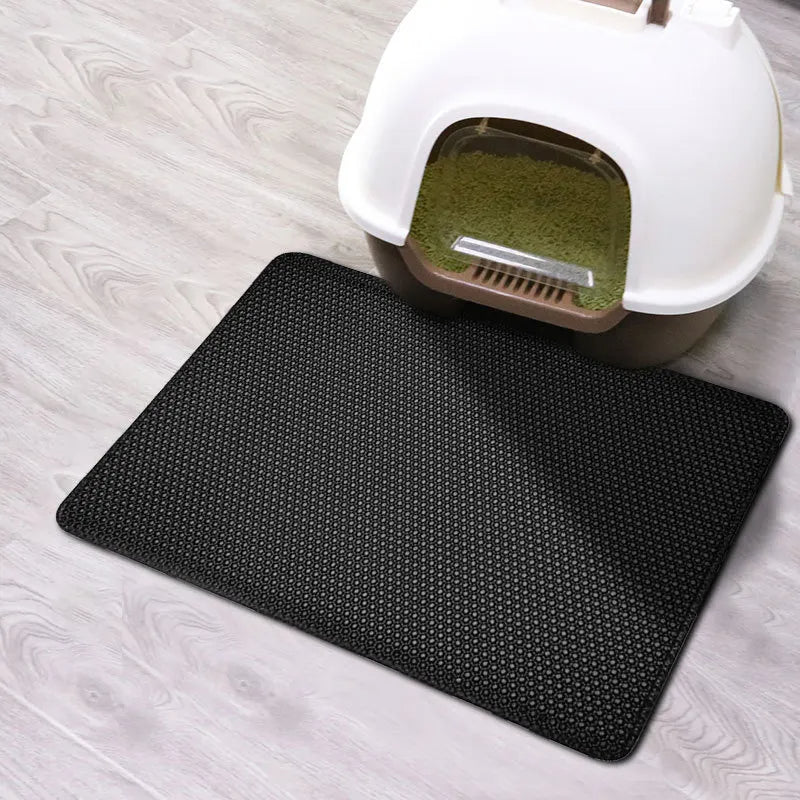 Stop scattered kitty litter with this waterproof double layer mat, traps mess, easy clean, non-slip design.