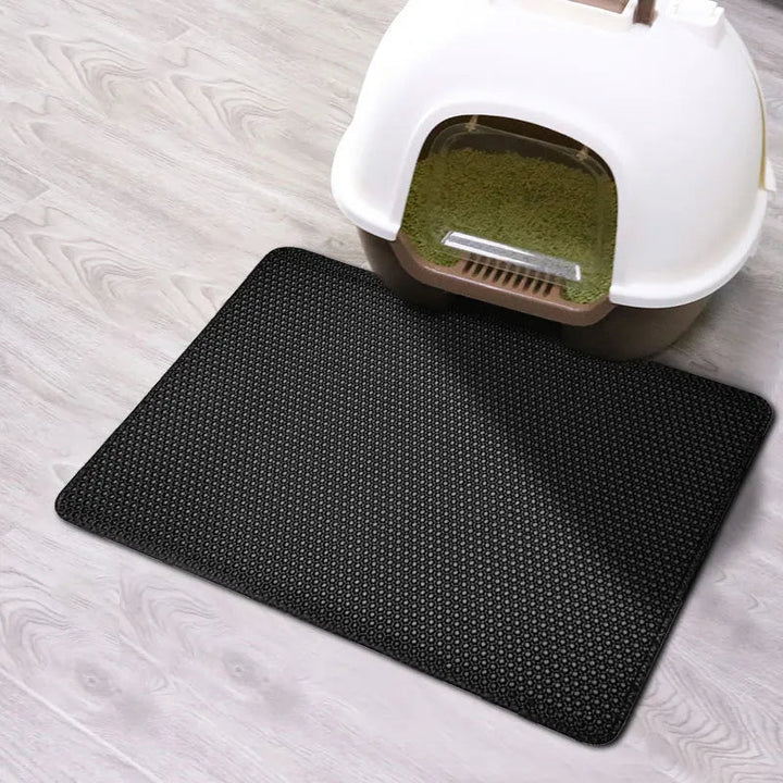 Stop scattered kitty litter with this waterproof double layer mat, traps mess, easy clean, non-slip design.