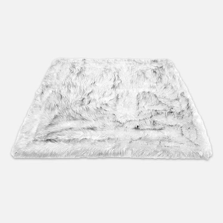 Versatile waterproof pet blanket for large & small dogs and cats. Reversible faux fur/microsuede offers cozy protection.