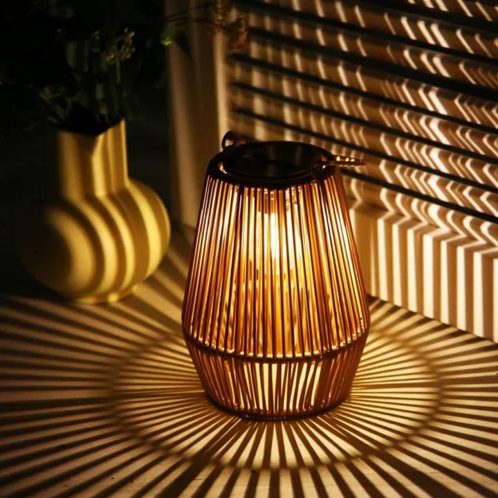 Waterproof solar garden lamp with handwoven rattan design, ideal for outdoor LED lighting.