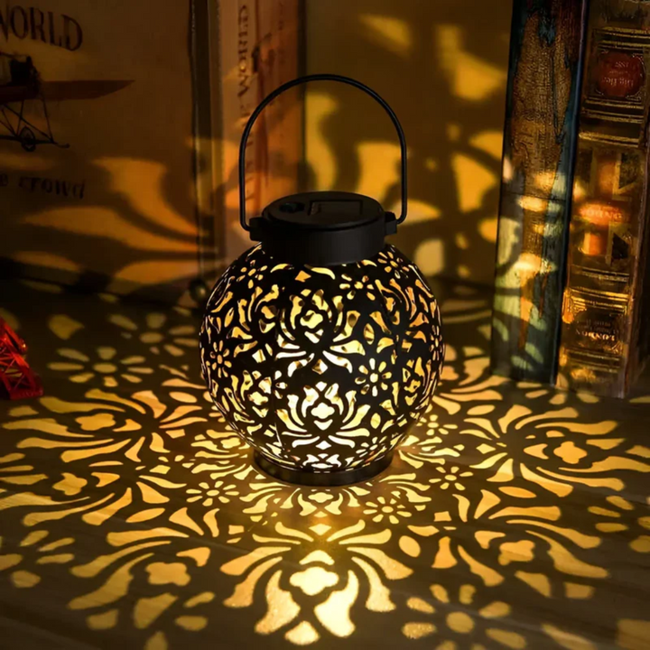 Set of solar-powered waterproof LED garden hanging lanterns, enhancing outdoor patio ambiance.