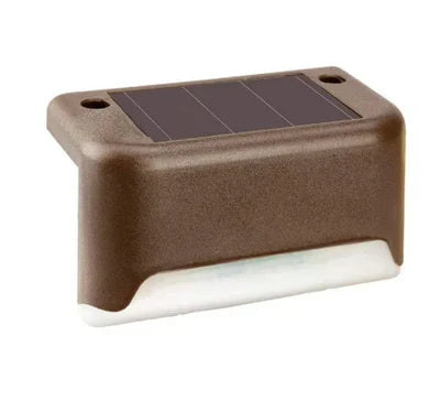 Brown waterproof solar garden path light. Wireless, energy-efficient outdoor landscape illumination for pathways.