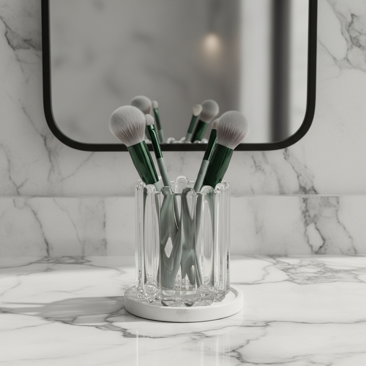 Wavy makeup organizer brush holder made of clear glass, perfect for vanity storage and cosmetics.