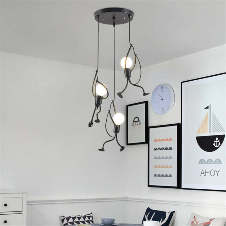 Playful doll pendant lamp, a unique iron fixture, ideal for brightening a kids' room with whimsical, cheerful decor.