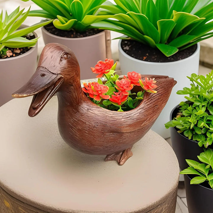 Decorative duck planter pot, a fun 'QuackyPlanter' for succulents and indoor plants, adds whimsical home decor.