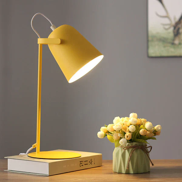 Nordic macaron desk lamp in colorful iron, a modern accent for contemporary home decor.