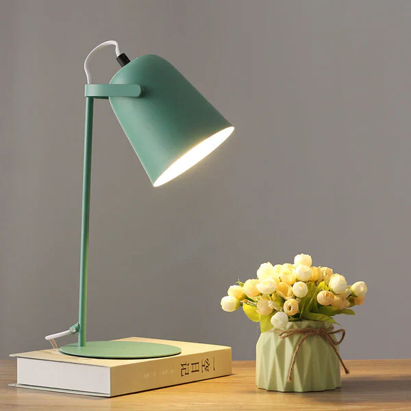 Stylish iron bucket bedside lamp with whimsical macaron design, perfect for ambient home lighting.