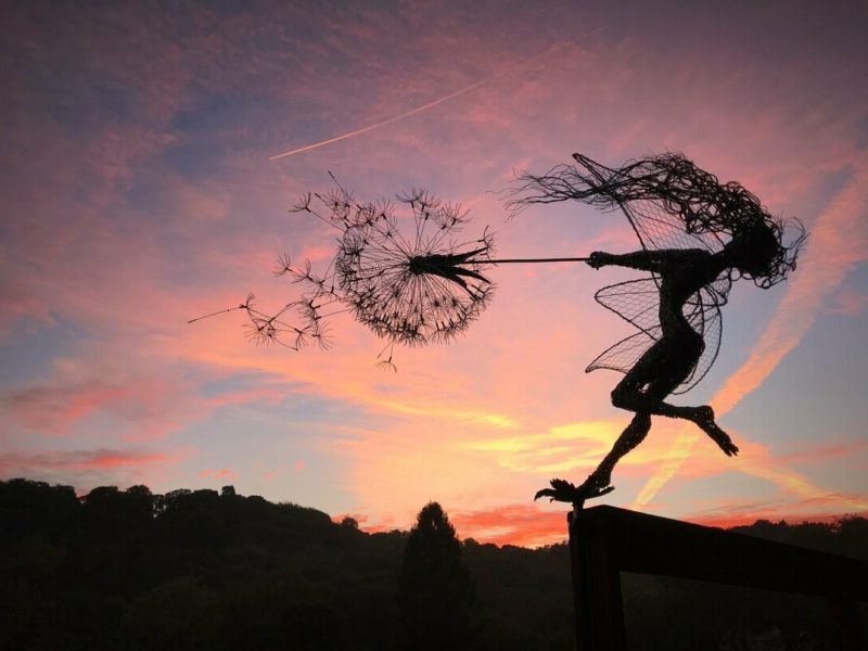 Delicate whimsical dandelion garden stakes with dancing metal fairies. Unique enchanted garden decor.