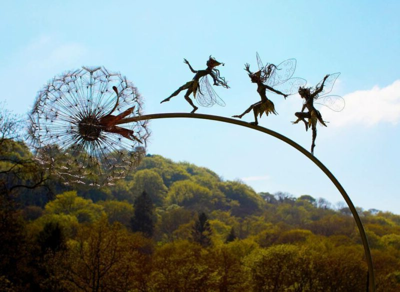 Mythical dancing fairy garden decor. Metal art dandelion stakes to create a whimsical outdoor wonderland.