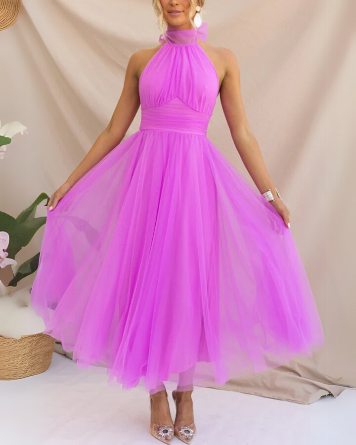 Whimsical tulle midi dress for women. Elegant A-line party & wedding guest attire for special occasions.