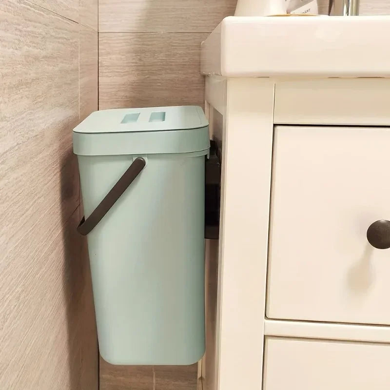 Silver 5L quiet-close sealed trash can for office or home, features odor control lid, compact and eco-friendly