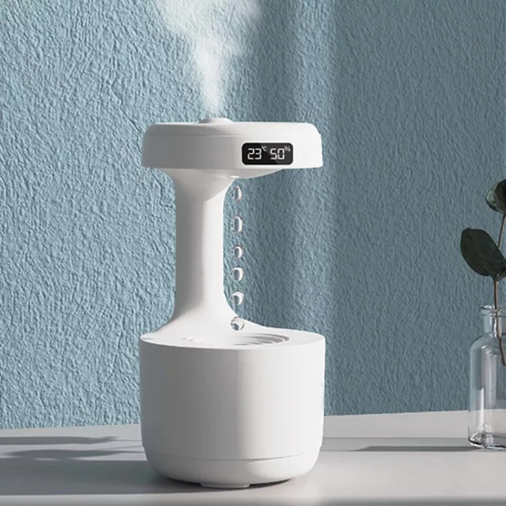 White AquaGlow luxury anti-gravity humidifier diffuser. Modern home decor for air quality & relaxation.