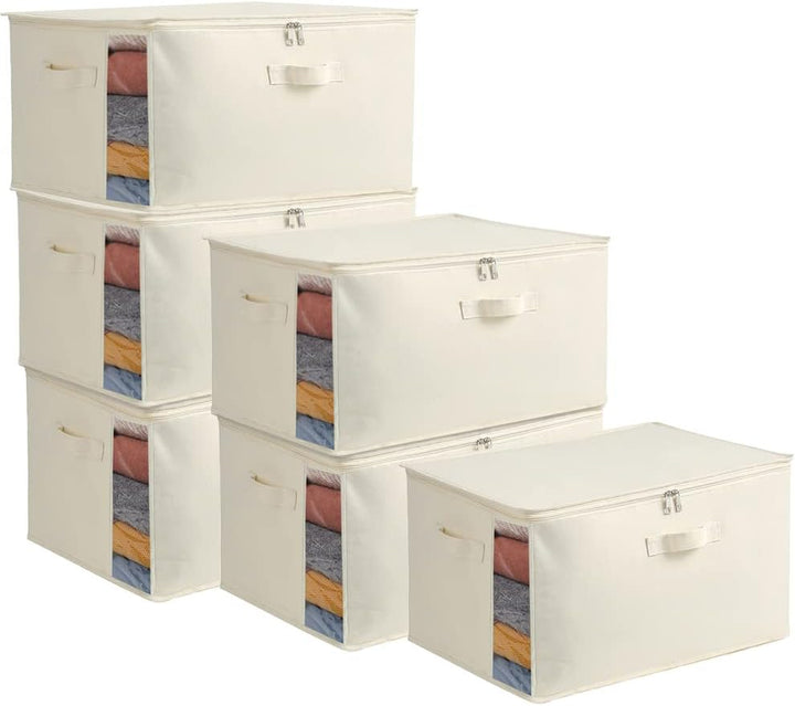 Large capacity canvas bedding storage bag with white fabric, dual zippers, and strong handles.