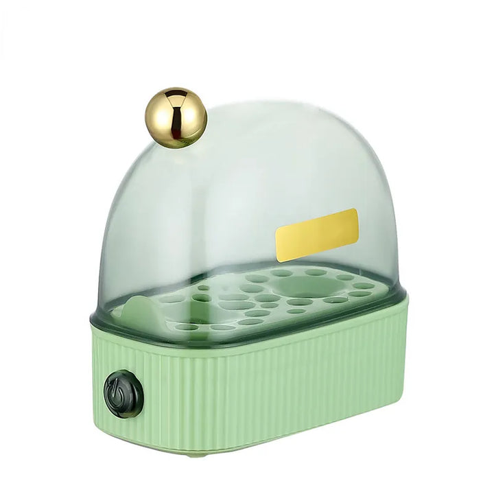 Green compact electric egg cooker, ideal breakfast maker for small kitchens, quick steam cooking.