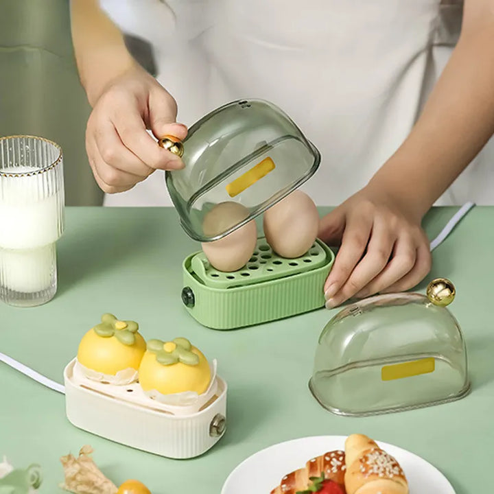 White automatic electric egg cooker. Stylish, quick cook, and easy-to-use breakfast appliance.