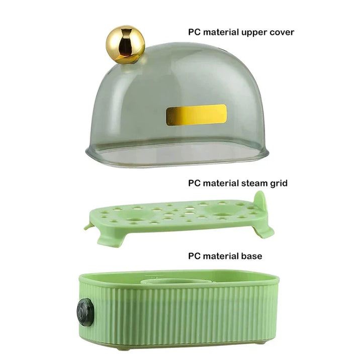 White & green compact electric egg cooker, a quick cook breakfast maker with automatic shutoff.