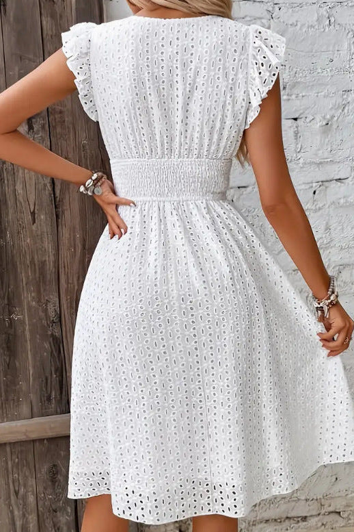 Elegant women's strapless midi dress in intricate jacquard fabric, perfect for spring and summer fashion.