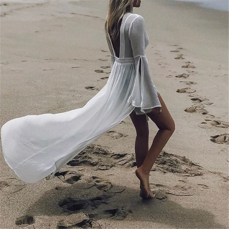Women's white maxi beach dress featuring an elegant open back and stylish kimono flare sleeves.