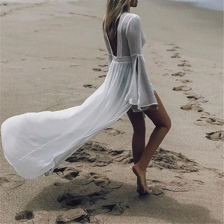 Women's white maxi beach dress featuring an elegant open back and stylish kimono flare sleeves.