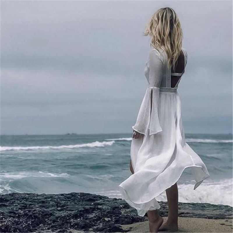 Stunning white open back maxi dress, elegant flowy resort wear, ideal for summer beach vacations.