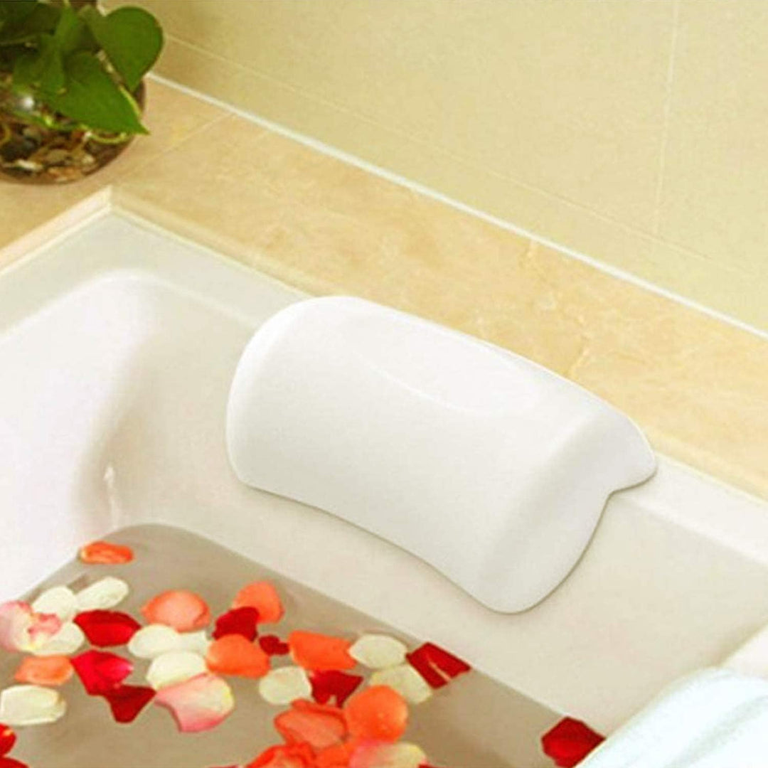 Soft white spa pillow designed for neck and head support, enhancing bathroom relaxation and self-care.