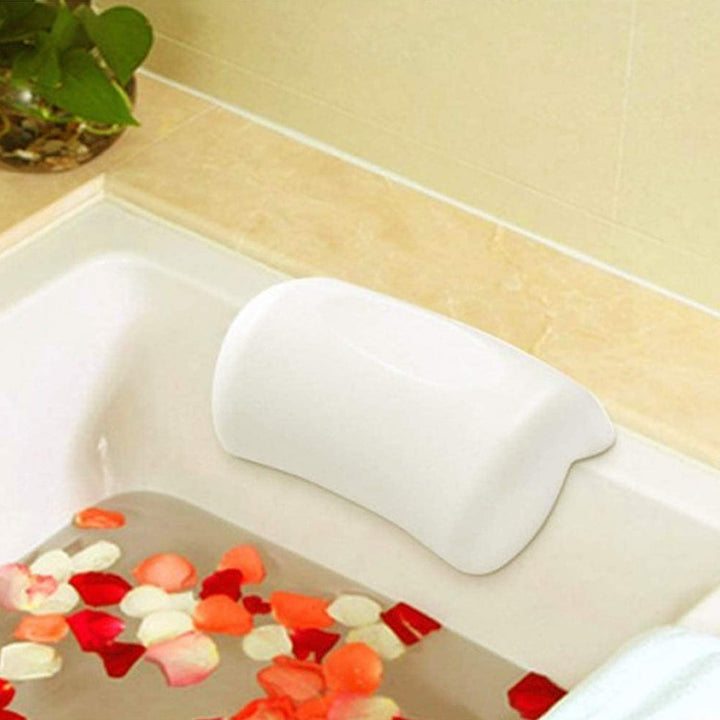 Soft white spa pillow designed for neck and head support, enhancing bathroom relaxation and self-care.
