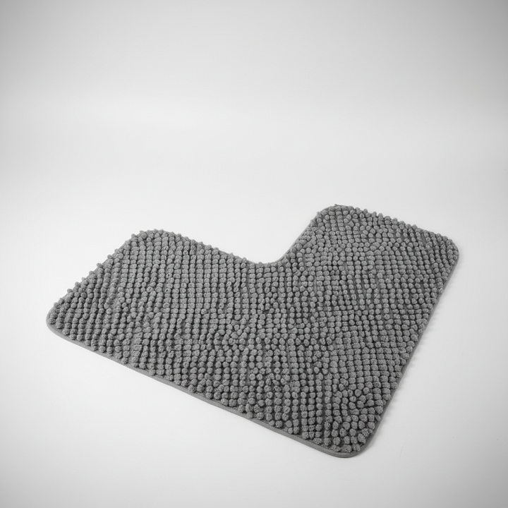Unisex L-shaped corner bath mat in a modern bathroom setting, enhancing shower floor safety.