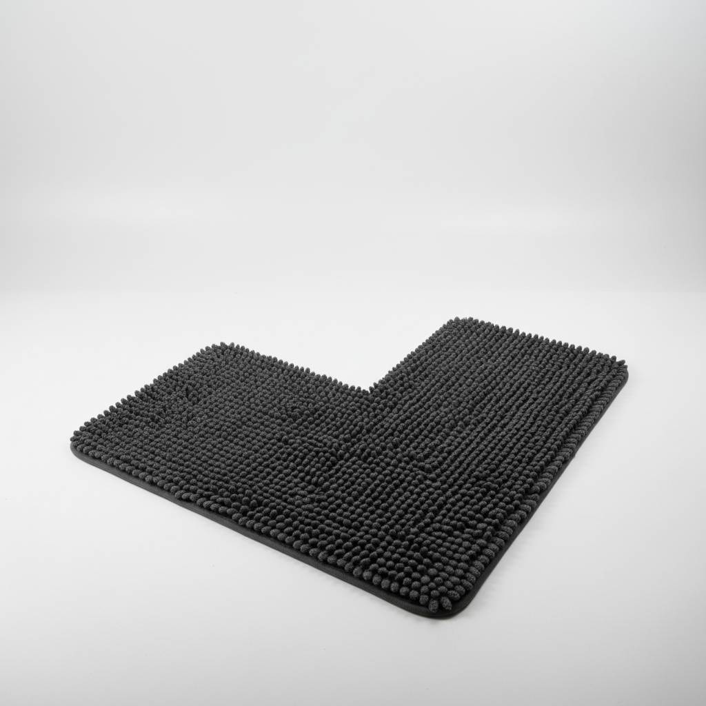 Folded L-shaped corner bath mat, highlighting its soft fabric and machine washable feature for convenience.