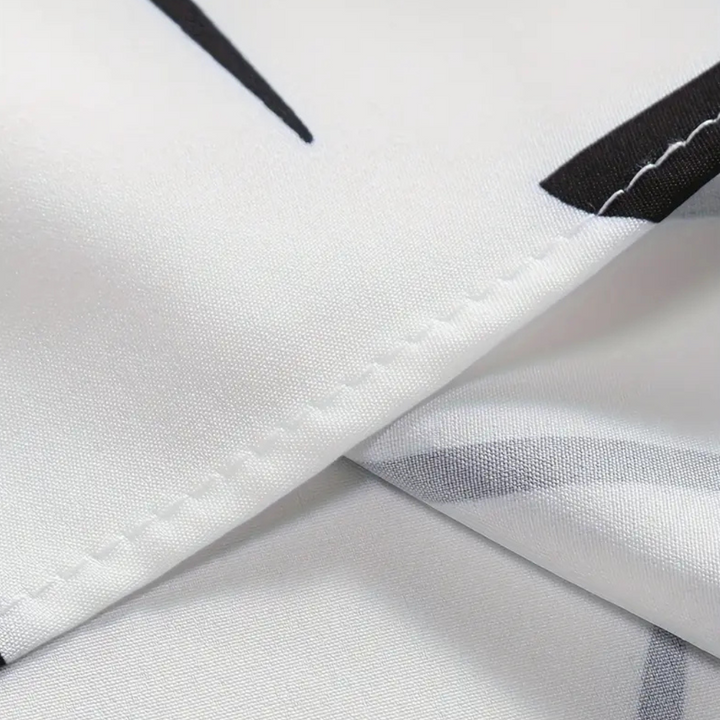 Elegant men's classic button-down shirt in white, suitable for smart casual and business casual outfits.