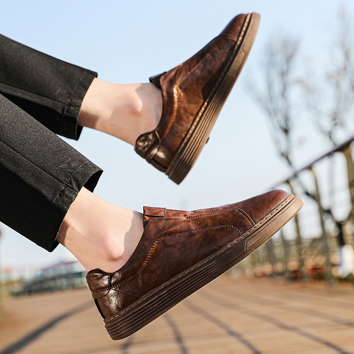 Premium white mens casual sneakers. Comfortable low-top everyday style footwear.