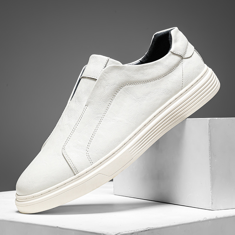 Black low-top mens sneakers. Hand-finished for stylish, comfortable everyday wear.