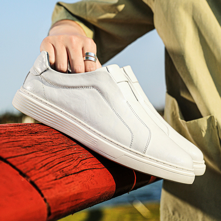 Everyday white mens sneakers. Classic low-top design for ultimate comfort.