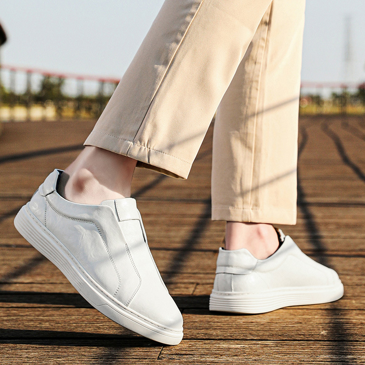 Black men's stylish dress sneakers. Hand-finished for a versatile, premium look.