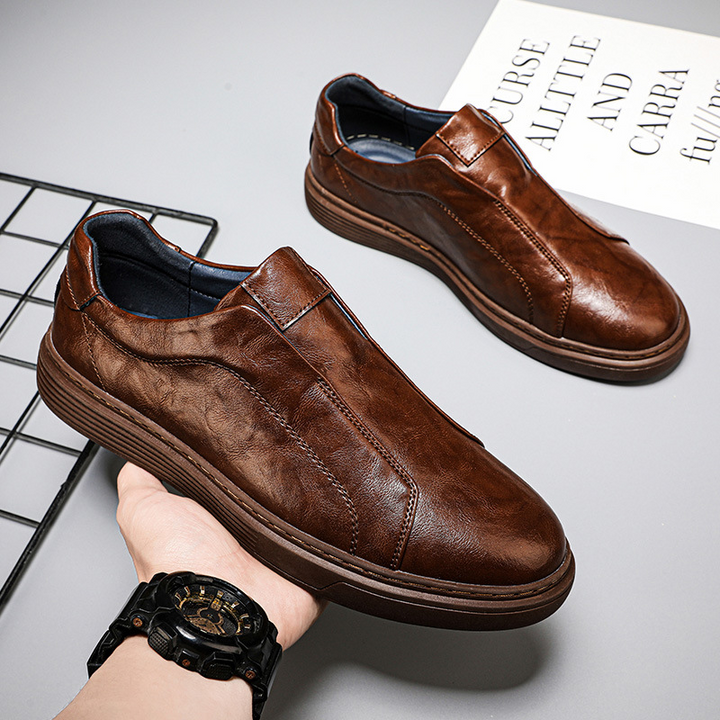 Brown men's classic casual shoes. Comfortable low-top everyday style sneakers.