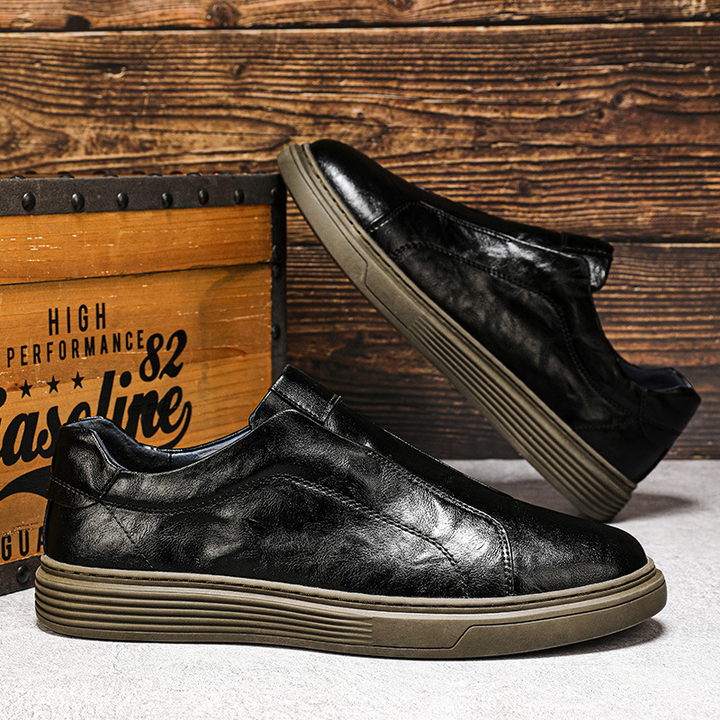 Brown men's comfortable classic sneakers. Low-top versatile casual footwear.