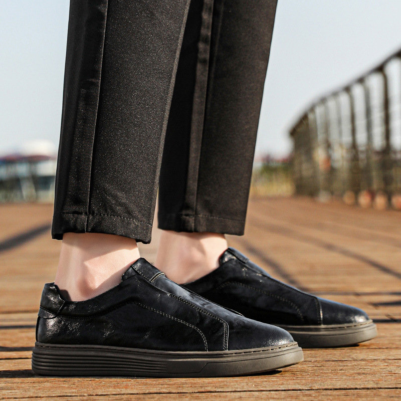 Elegant black mens hand-finished sneakers. Stylish & comfortable versatile footwear.